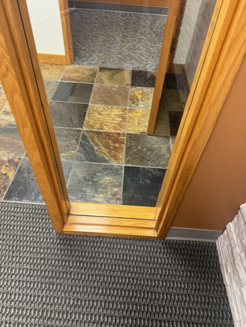 Full-length mirror with a custom wood frame