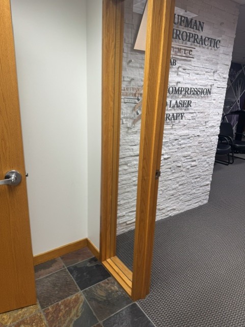 Custom glass office door in a wood frame